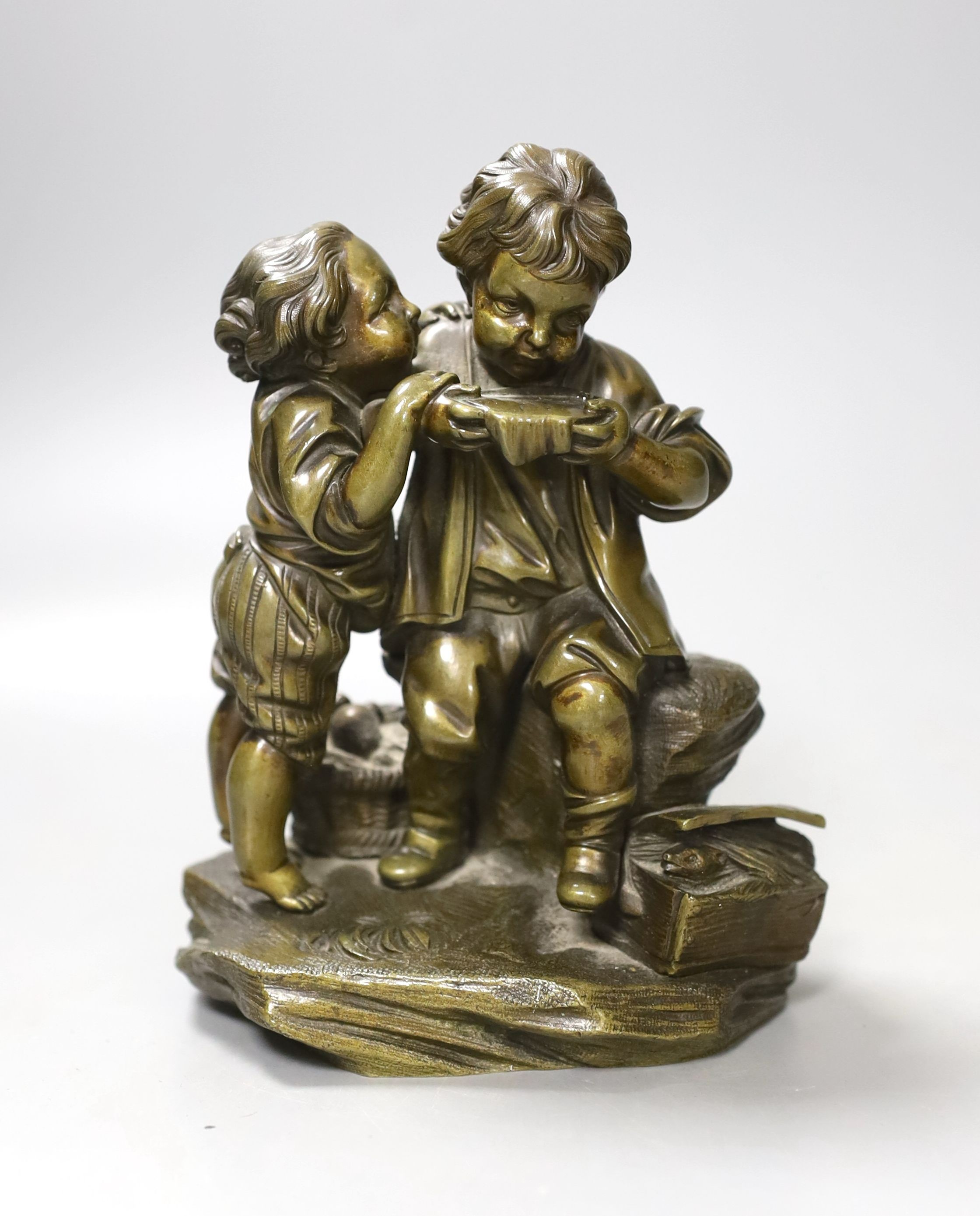 A Victorian cast bronze child figure group - 17cm tall